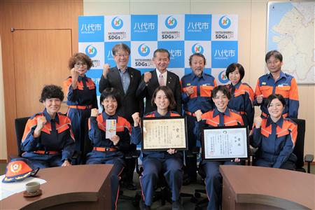 八代市消防団八代方面隊本部分団の皆さんと関係者ら