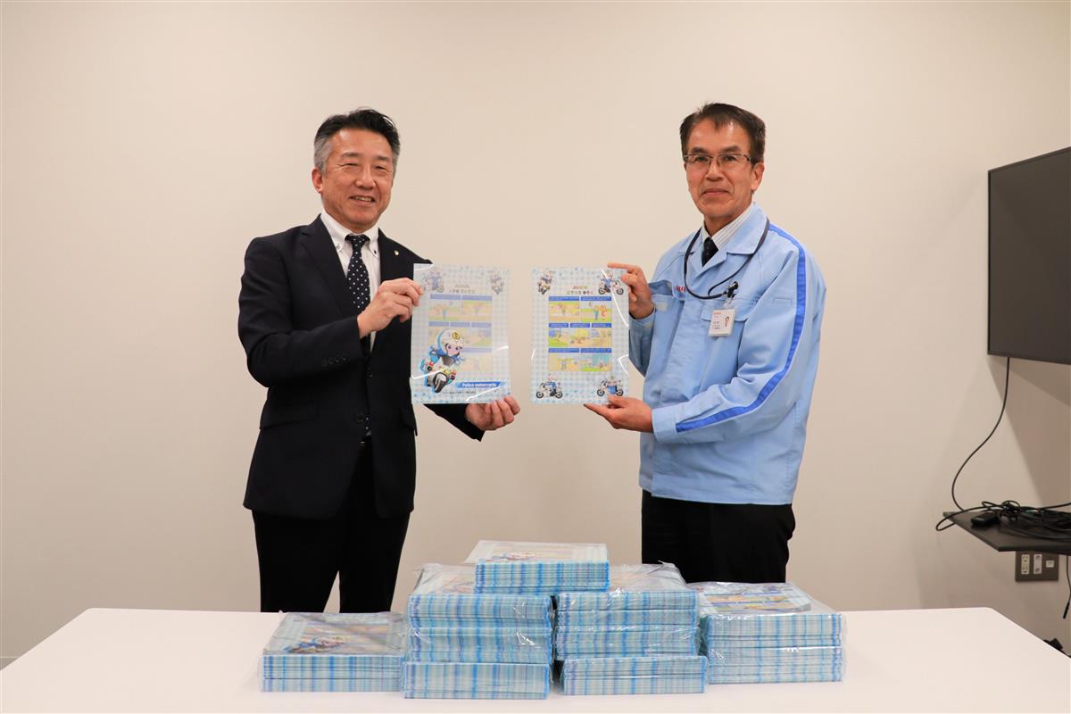 中教育長(左)と水谷取締役(右)の画像