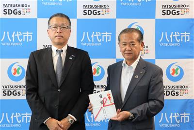 ▲杉代表取締役社長(左)と中村市長(右)
